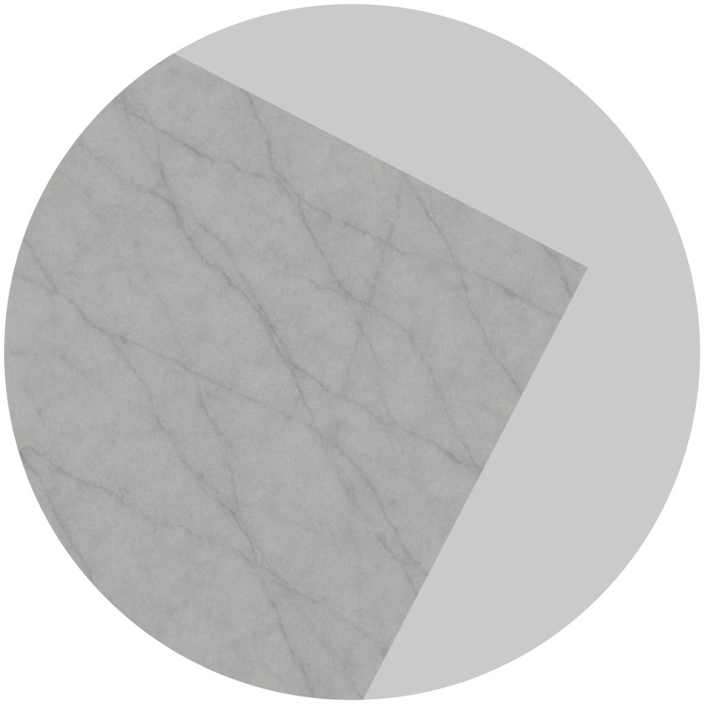 A large marble-textured circle with a wedge-shaped slice missing, revealing a plain gray background beneath.
